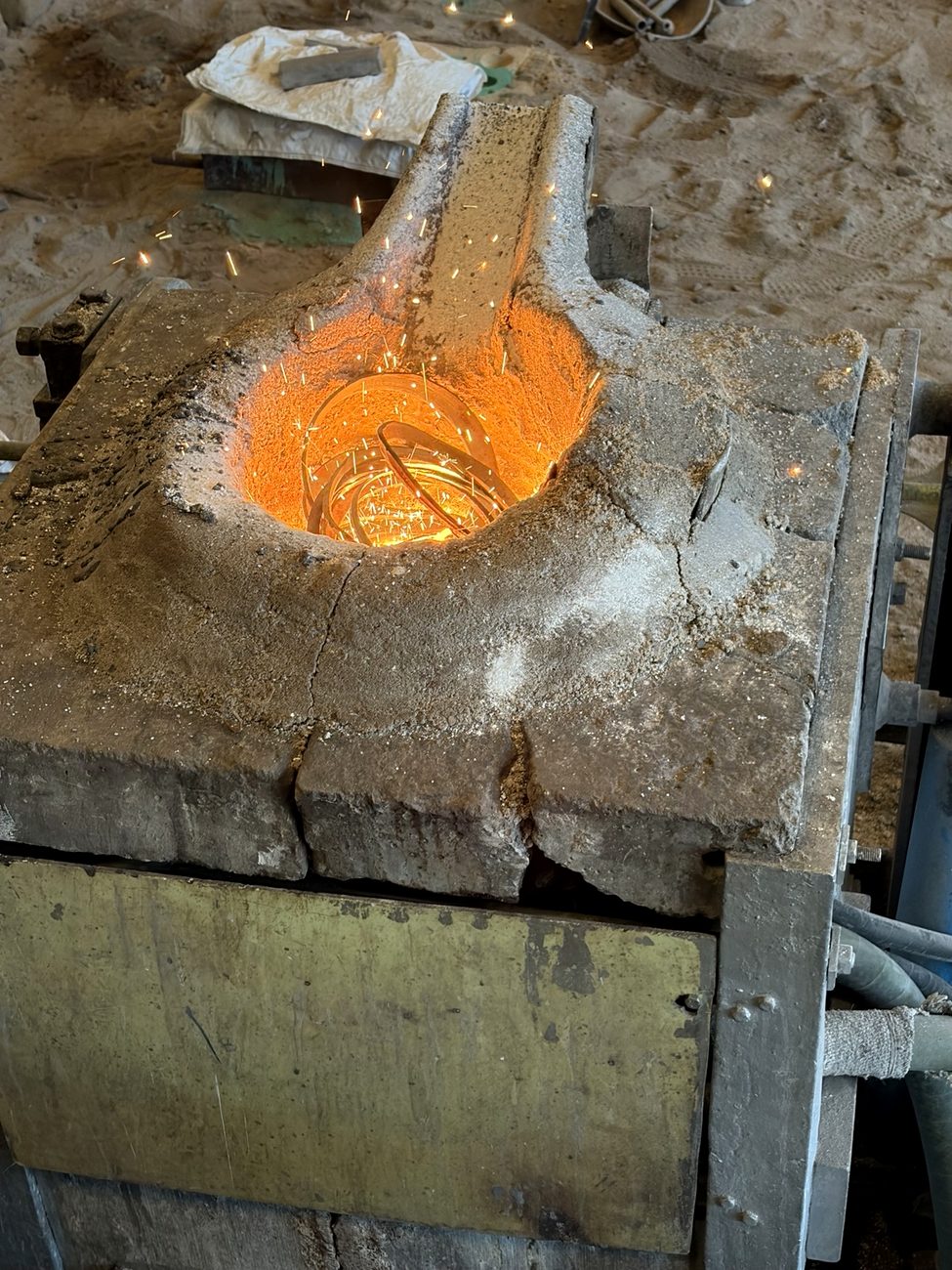 Induction furnace melting at Nittand Casting Works